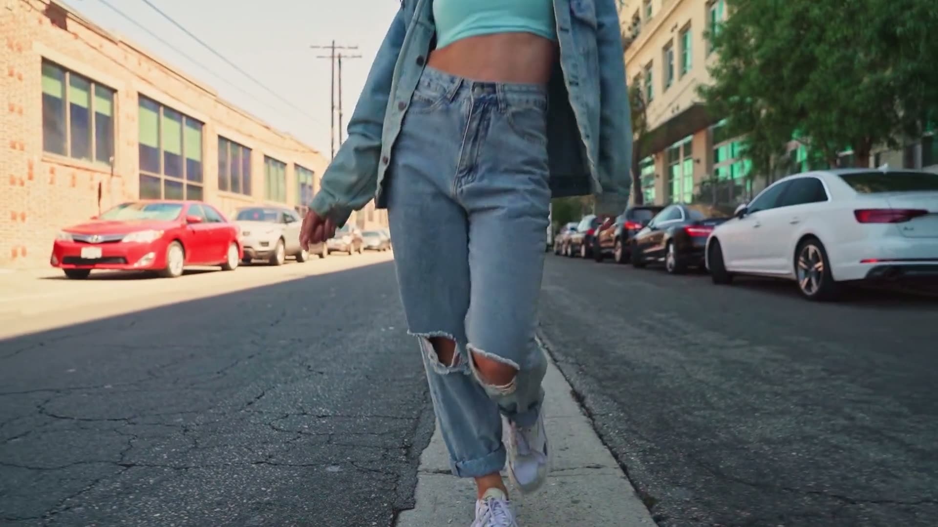 A model walking down a city street