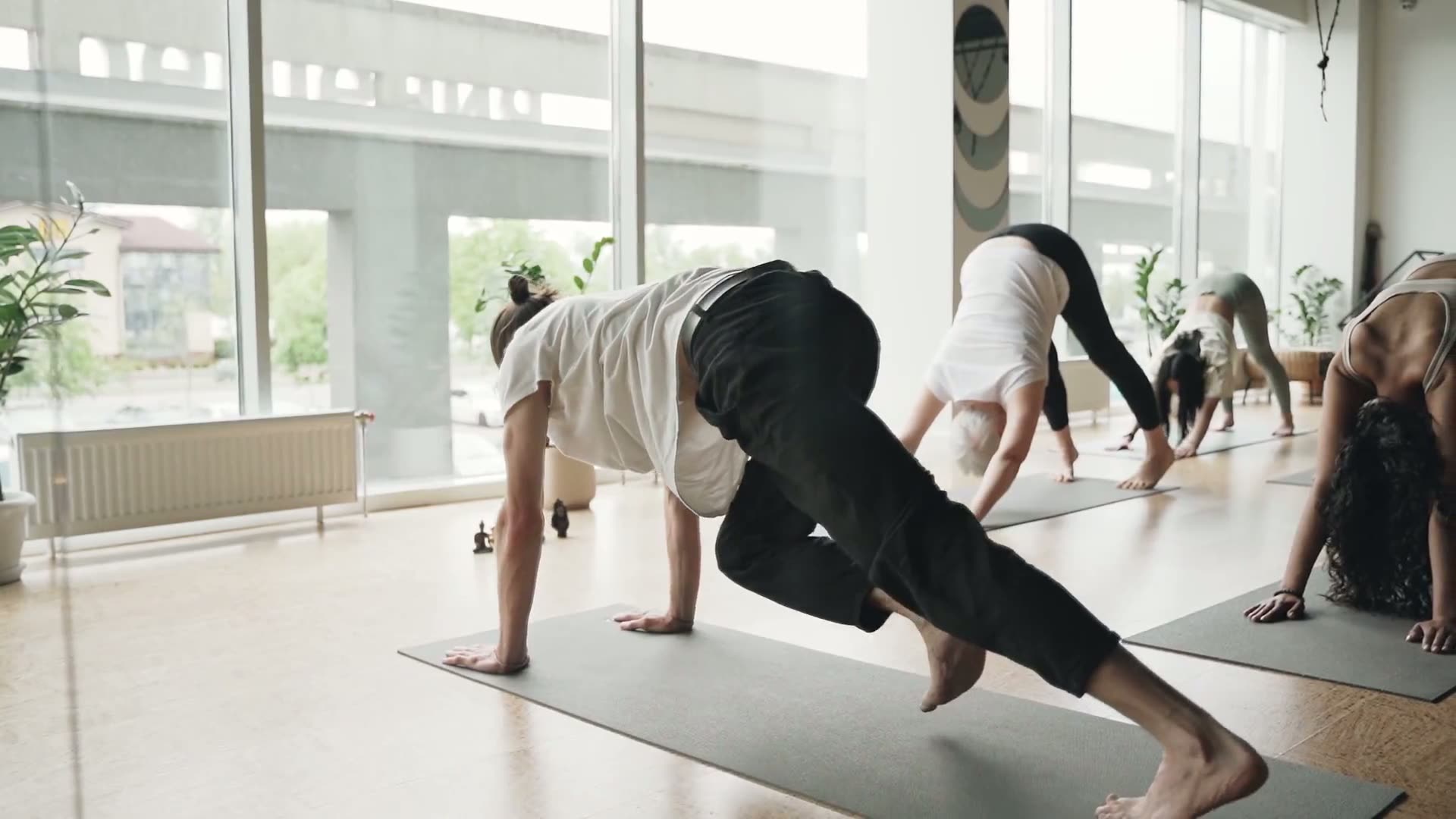 A yoga class in a bright studio