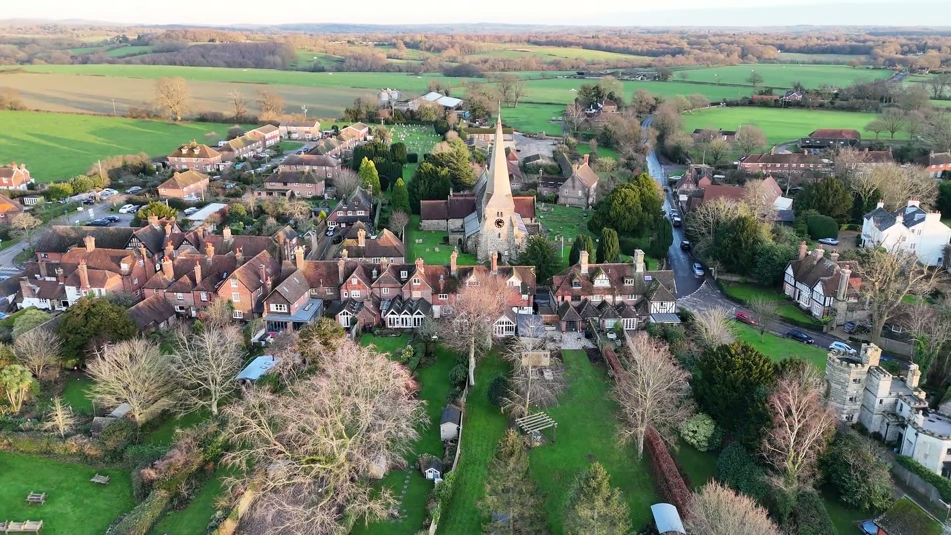 Aerial view of an English village and its church